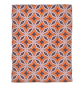 Close-up of the intricate damask pattern on the duvet cover